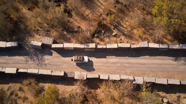 Car circulating marble blocks in angola