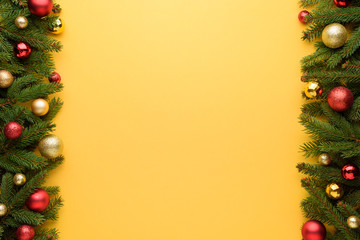 Christmas or New Year decoration border on Yellow background