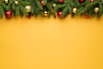 Yellow Christmas or New Year decoration background with border