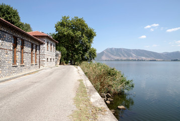 Fototapeta na wymiar Panorama of a mountain lake and embankment