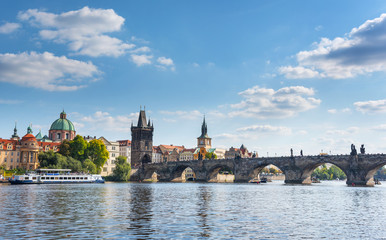 View of the city of Prague and the Charles Bridge and Vltava River.