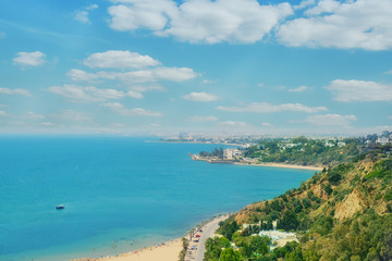 Sea, beach, promenade and coastal road in Sidi Bou said, top view. Mediterranean marine landscape, Tunisia. June, 2019