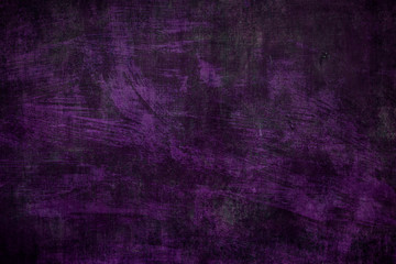Purple paint on a canvas, grungy background or texture