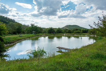 pond with bench