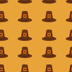 Seamless repeating Thanksgiving pilgrim hat background on orange.
