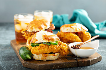Breakfast biscuit sandwiches with fried chicken, traditional southern food