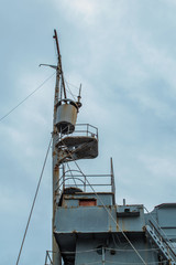 masts of a ship against a blue sky