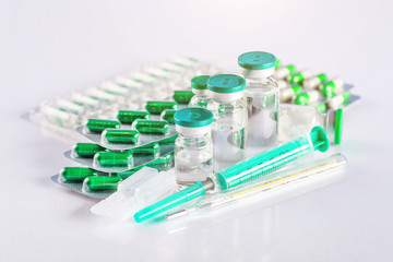 Drug prescription for treatment medication. Pharmaceutical medicament, cure in container for health. Pharmacy theme, capsule pills with medicine antibiotic in packages.