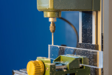 CNC  milling machine processes glass