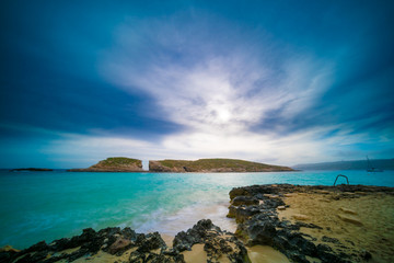 Pure crystal turquoise water of Blue Lagoon in Comino Malta