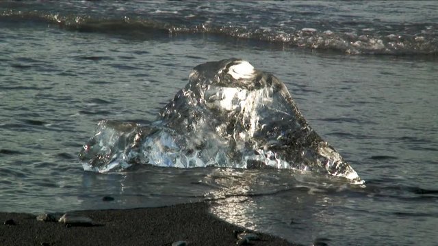 High angle, chunk of ice on Iceland beach