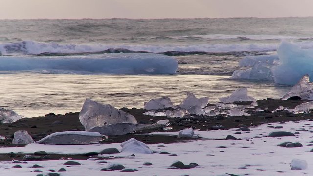 Wide, sunset over frozen beach in Iceland