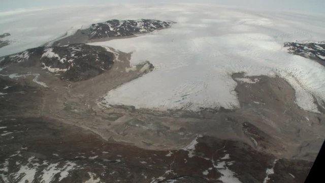 View of glacial mountains from helicopter, aerial