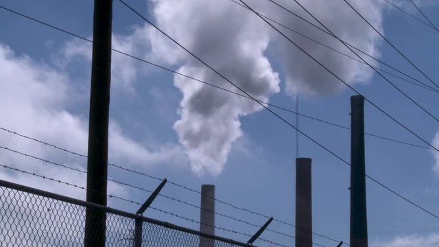 Low angle, factory smoke