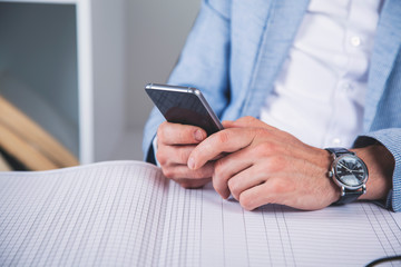 man hand phone with document