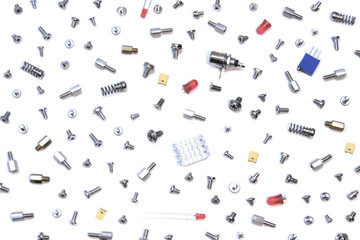 mix of bolts, screws and pins on white background