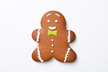 The hand-made eatable gingerbread little man on white background