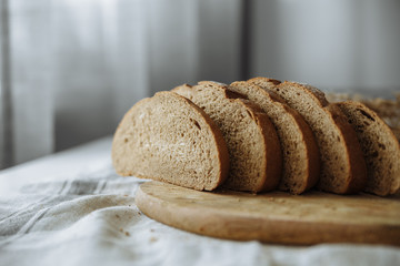 Sliced bread on a wooden board