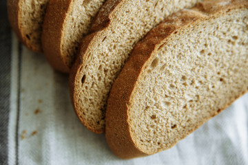 Sliced bread on a wooden board