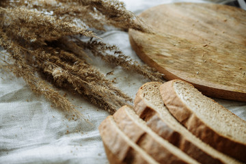 Sliced bread on a wooden board