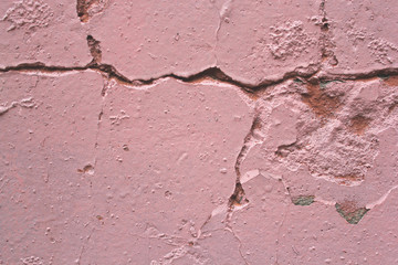 Wall texture with old plaster. Close-up photo. Urban background.