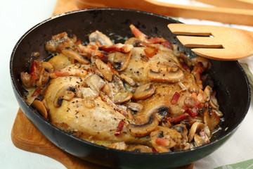 Cooking Roasted Chicken with Mushrooms and Bacon