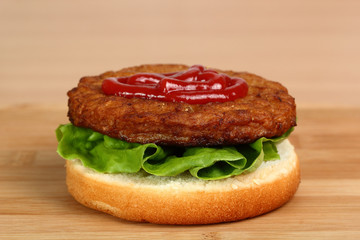 Spread Ketchup on Patty. Making Hamburger. Macro. Series.