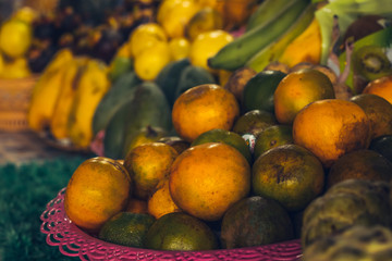 tangerines on the market, selling fruits on the street in Thailand