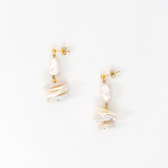 Freshwater pearl stud earrings, isolated white background