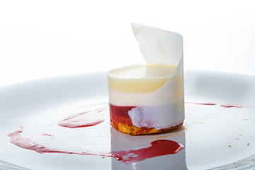 closeup exclusive decorated fruit and cream mousse dessert