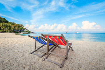 Colorful Wooden Bench Chairs on Tropical Beach