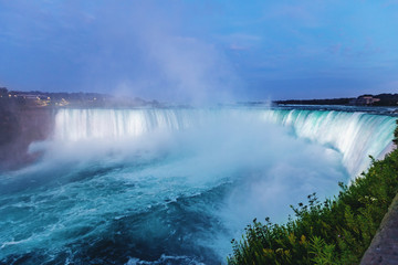 Niagara Falls seen at dusk from Canada