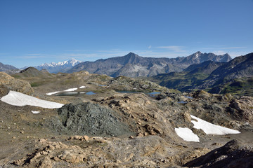 back from the tip of mean martin in vanoise, the plan of the ovens and its lakes and in the distance the mont blanc massif