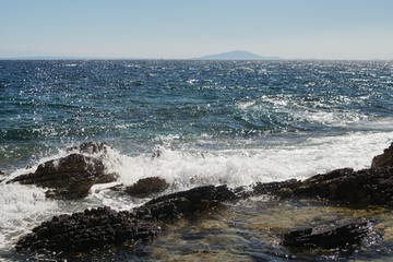 waves crashing on the rocks