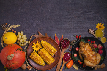 Chicken or turkey, autumn fruits and vegetables. Thanksgiving food concept. Harvest or Thanksgiving background. Flat lay, copy space, horizontal image