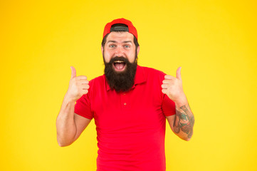 Thumbs up. Approve or recommend concept. Man happy smile unshaven face shows thumbs up gesture...