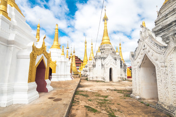 Fototapeta premium golden pagodas at inle lake, myanmar
