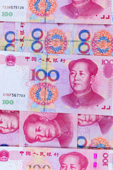 pile of many type china banknotes,  yuan currency. the currency which Influence on the world economy. money game powers. economy and funds concept.
