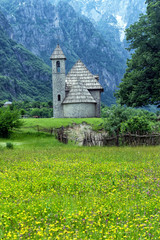 Flowers and Church in Theth Valley, Albania