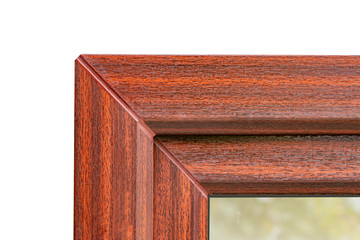 Fragment of a new plastic window with lamination