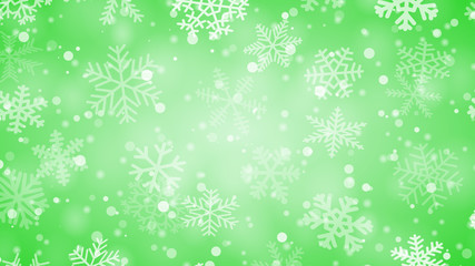 Christmas background of snowflakes of different shapes, sizes and transparency in green colors