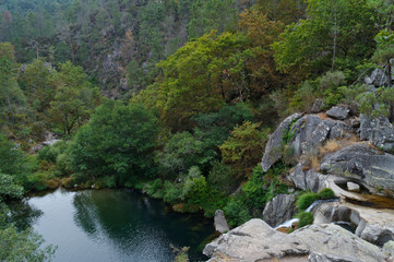 Waterfall at a natural spot called Poço Negro in Carvalhais, Sao Pedro do Sul, Portugal
