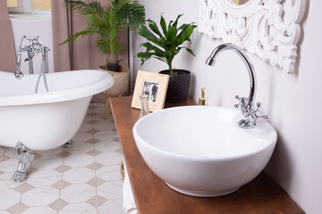 White bathroom interior in a vintage style..