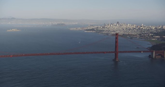 Aerial shot, day, distant view of golden gate bridge and san francisco at distance, drone