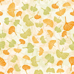 Endless pattern of large and small ginkgo leaves in green and yellow. Vector seamless pattern for textile, wrapping paper, decoration, etc.
