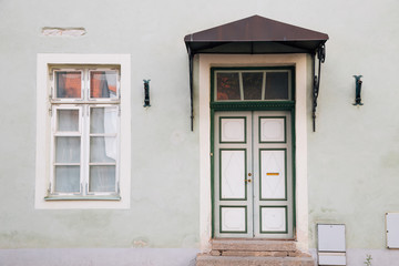 Fototapeta na wymiar House exterior, door and window in Tallinn, Estonia