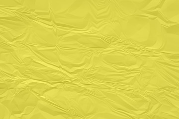 crumpled yellow paper background close up