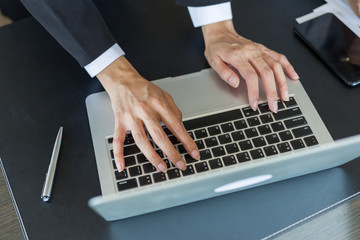 Fototapeta na wymiar Businesswomen typing keyboard on labtop or notebook, business online concept