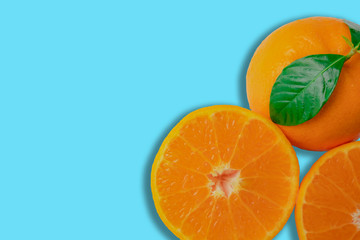 fresh oranges and green leaf close up view
