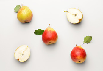 Fototapeta na wymiar Sweet ripe pears on white background